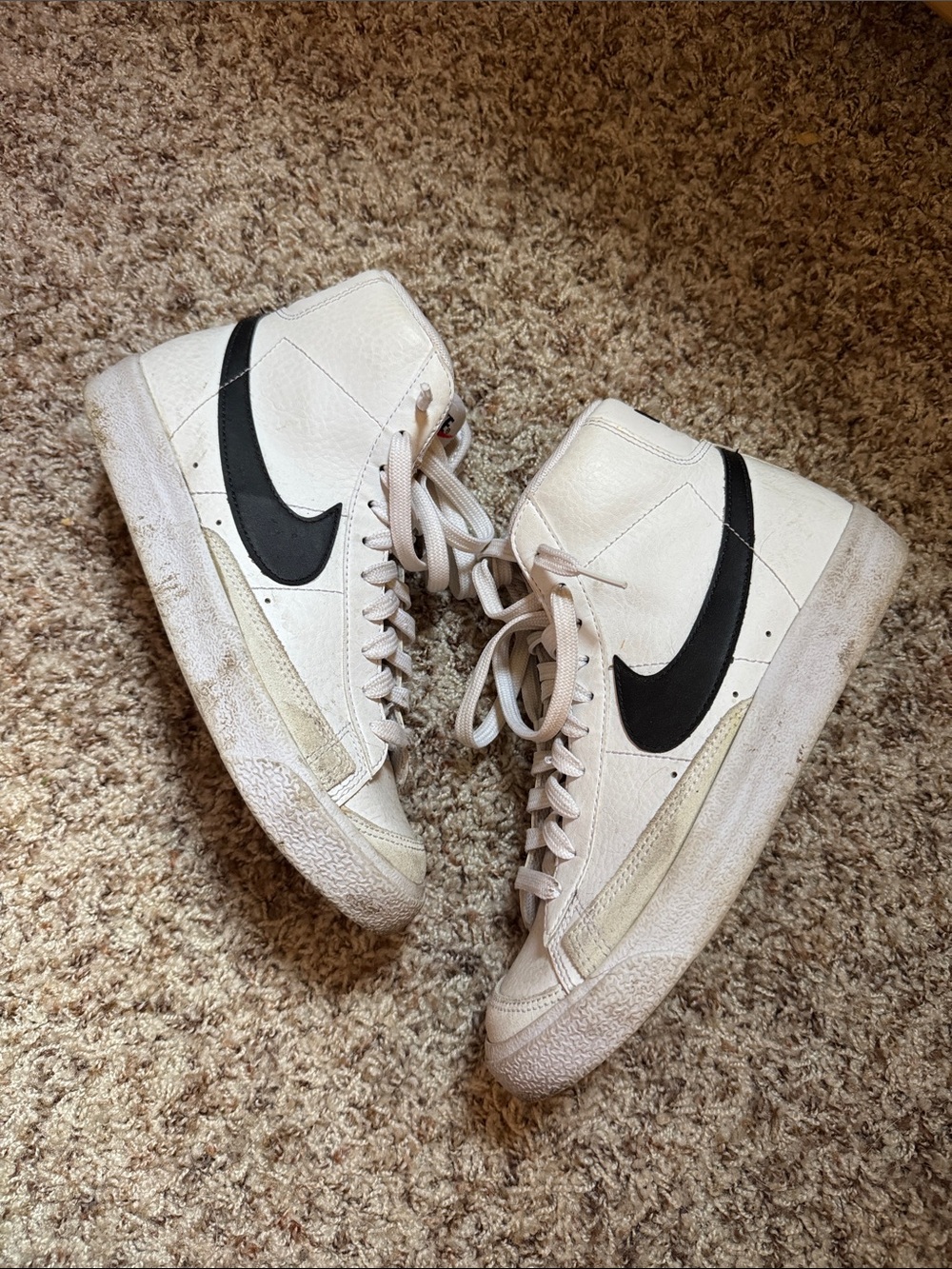 Nike Women's White High-Top Sneakers with Black Swoosh